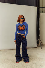 FIRST CLASS MID RISE JEANS