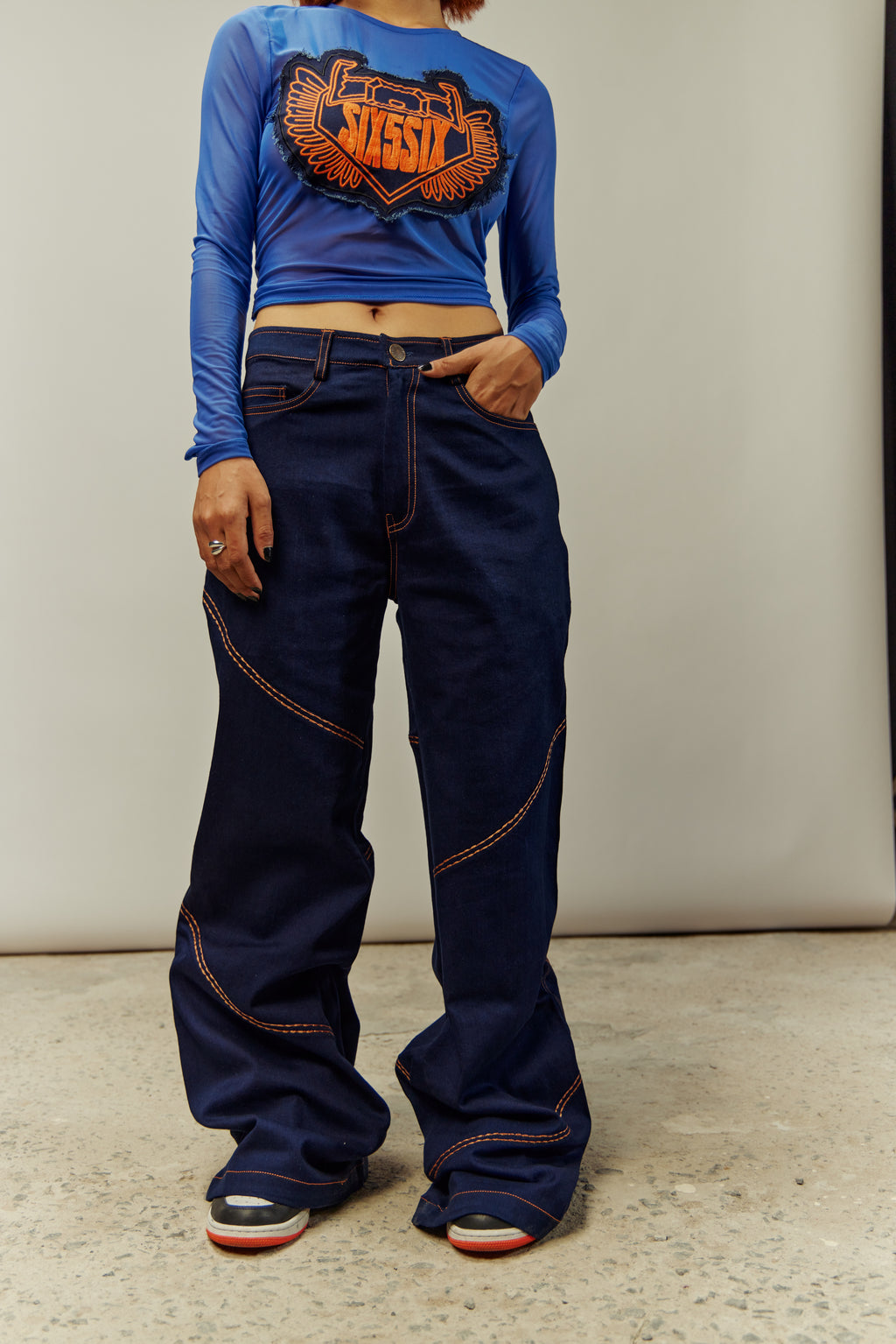 FIRST CLASS MID RISE JEANS